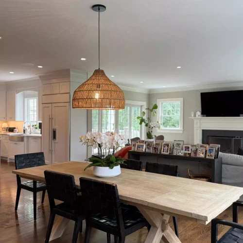 Bright dining area with cleaned wooden table and polished surfaces