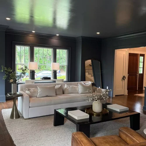 Freshly cleaned luxury living room with white sofa and coffee table