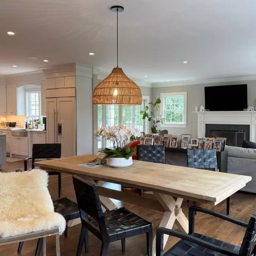 Spotless residential dining room with clean wooden table and chairs